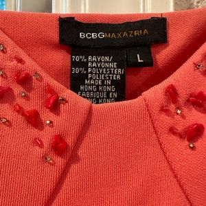 Coral knee length spaghetti strap dress